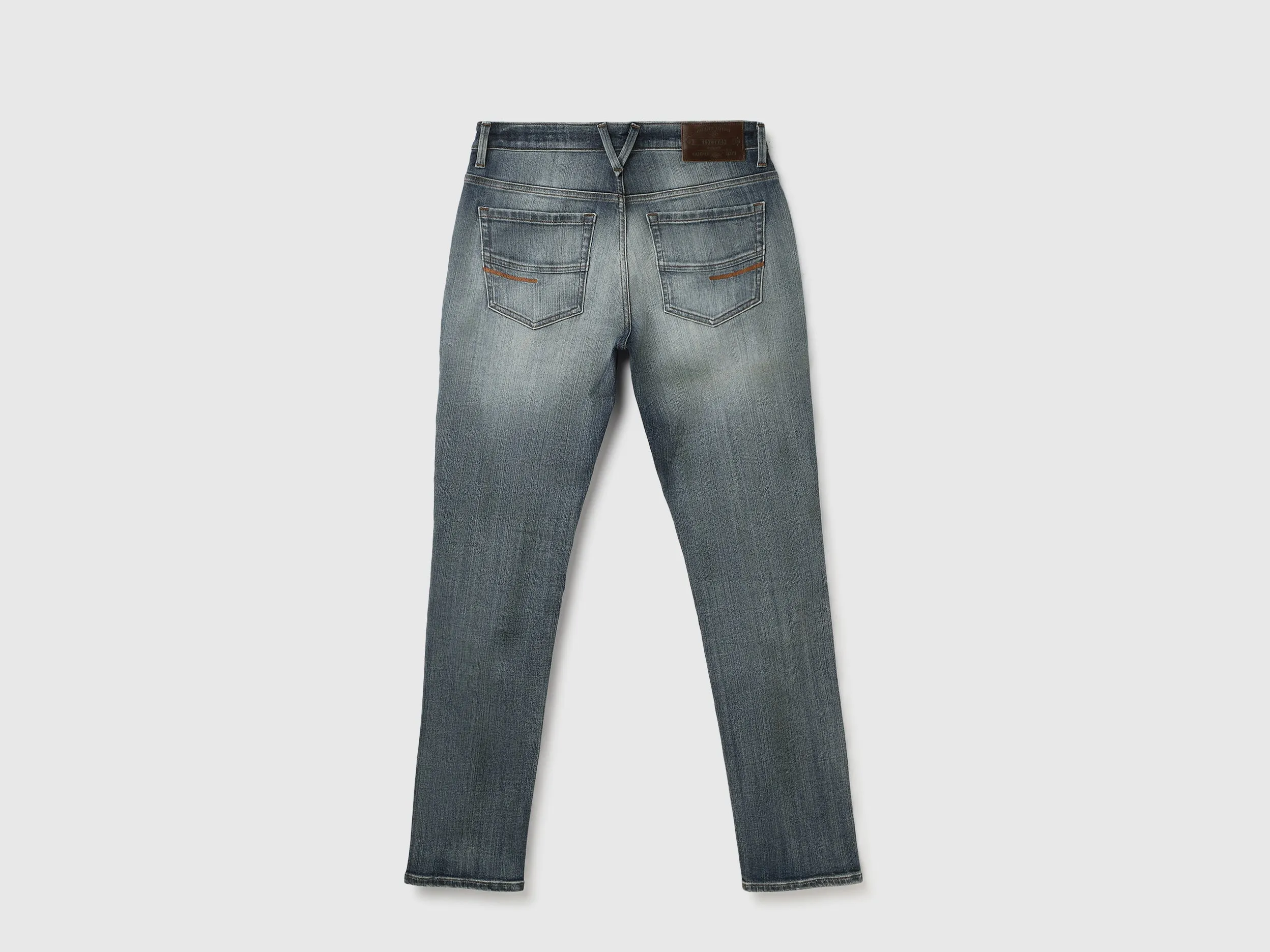 Solid Mid Rise Slim Straight Jeans