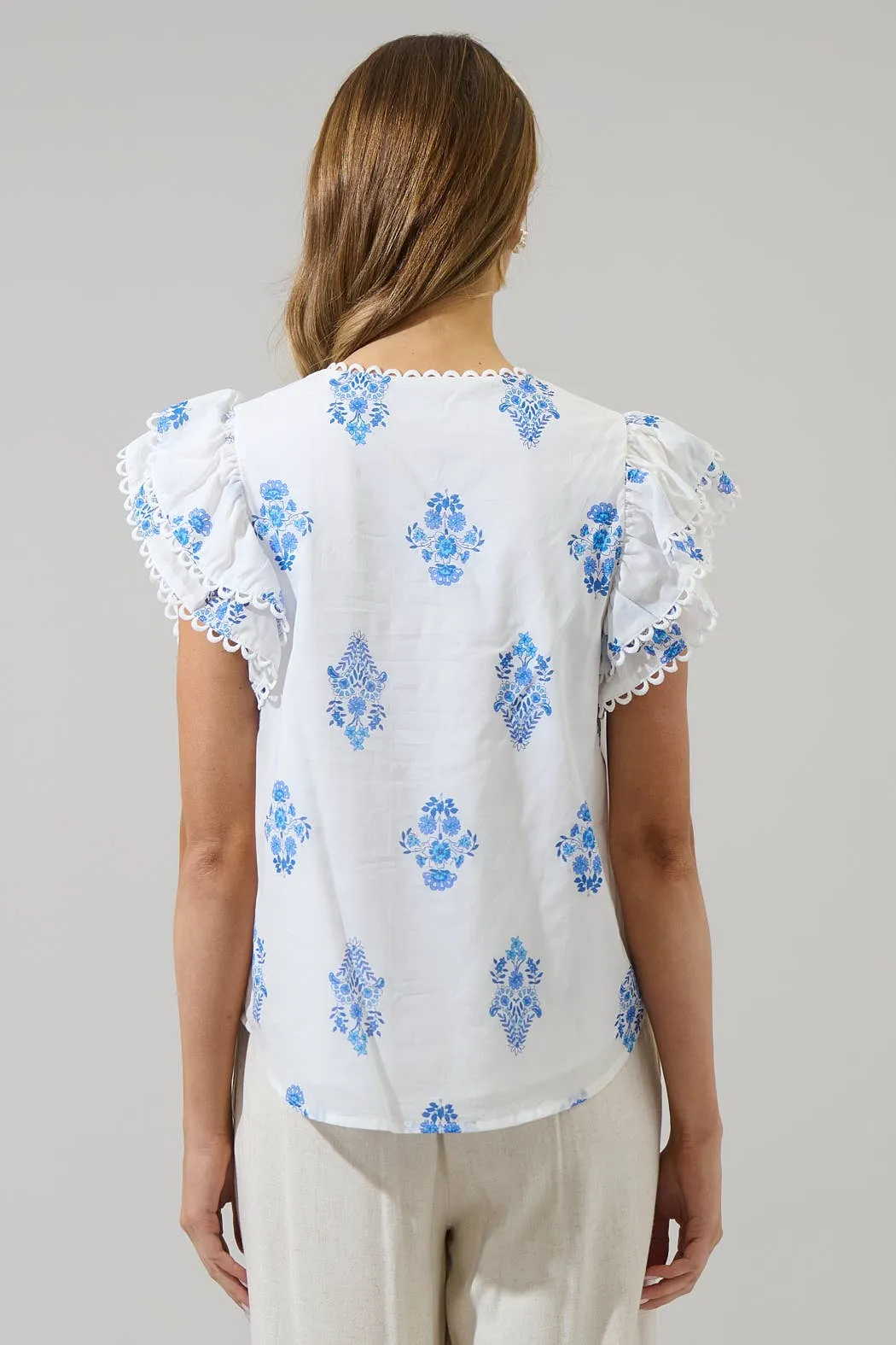 Yila Floral Ema Ruffle Top: WHT-BLUES