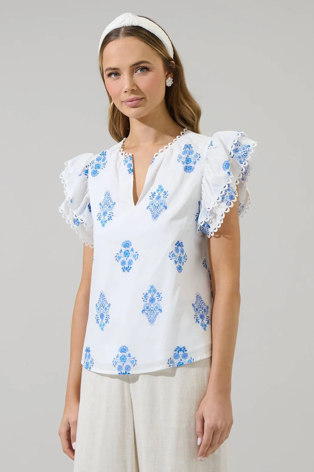 Yila Floral Ema Ruffle Top: WHT-BLUES