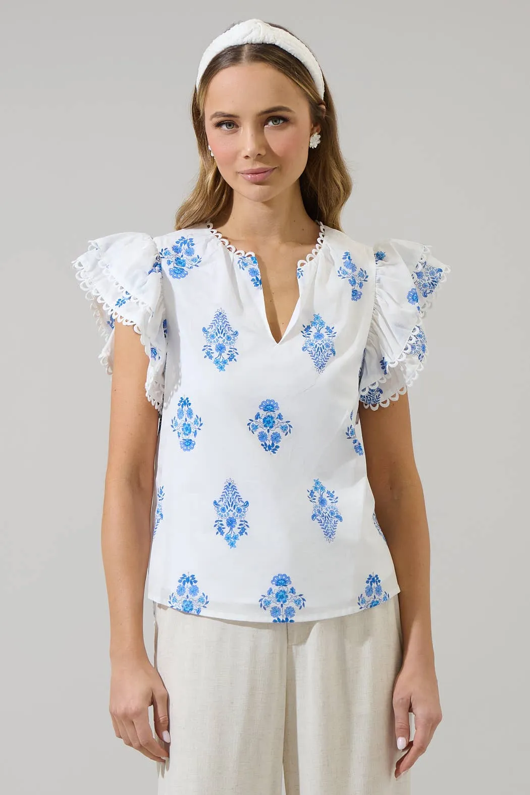 Yila Floral Ema Ruffle Top: WHT-BLUES